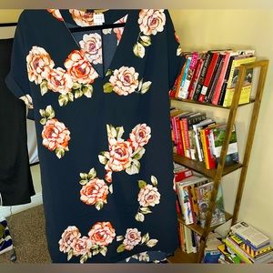 A fashionable high low dress. In great condition.